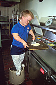 Dwarf Working as a Pizza Chef
