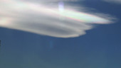 Iridescence in lenticular clouds