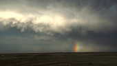 Rainbow and thunderstorm, timelapse