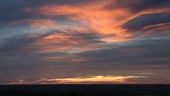 Beautiful clouds at sunrise, timelapse