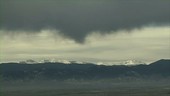 Virga from mountain clouds, timelapse