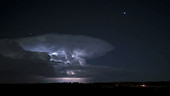 Thunderstorms passing at night