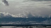 Clouds over a reservoir, timelapse