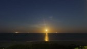 Moonrise over Miami coast, time-lapse
