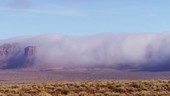 Monument Valley wrapped in clouds