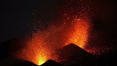 Lava erupting at night from Fogo volcano