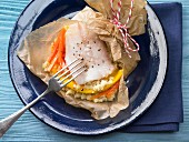Cod en papillote with carrot and mango