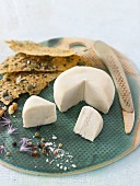 Vegan macadamia nut and pecan nut cheese with crackers