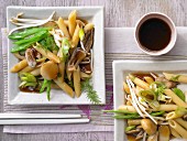 Asian noodles with vegetables and oyster mushrooms