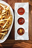 Chips with three different home-made ketchups