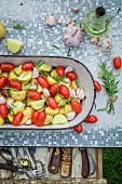 Oven-roasted potatoes with tomatoes, garlic and rosemary