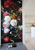 Photographic wallpaper in hall with view into open-plan kitchen