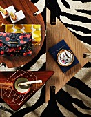 Various wooden coffee tables on zebra-patterned rug