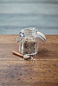 Vanilla and lavender salt in a glass jar with a swing-top