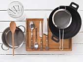 A wok and other kitchen utensils