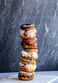 A stack of doughnut ice cream sandwiches