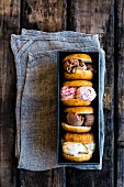 Doughnut ice cream sandwiches in a loaf tin