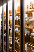 Storage jars in a cupboard at the Kadeau restuarant in Copenhagen, Germany