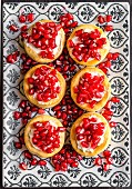 Vol au vents with cream cheese and pomegranate seeds