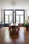 Kitchen counter in dining area of restored period apartment with stucco ceiling