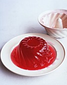 Red jelly shaped like a Bundt cake