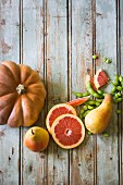An arrangement of winter pumpkin, pears, grapefruit and edamame