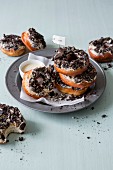 Doughnuts with white chocolate icing and Oreo biscuits