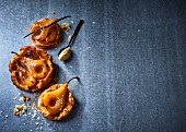 Caramlised pear tartlets with vanilla pods