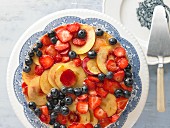 Berry and nectarine cake with yoghurt cream and cake glaze