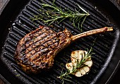 Grilled beef barbecue Veal rib on frying cast iron Grill pan