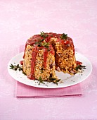 Italian rice timbale with tomato sauce