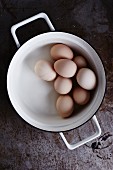 Hard-boiled eggs in a saucepan