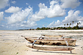 Ngalawa boat at low tide,Zanzibar