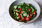 Melon salad with cucumber, chilli and basil