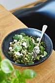 Quinoa salad with broccoli and herbs