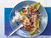 Steamed chicory with ham and cheese