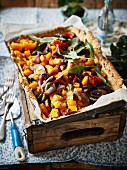A vegan walnut and vegetable tart for a winter picnic