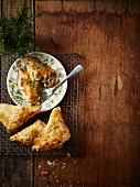 Puff pastry triangles filled with chicken, fennel and leek