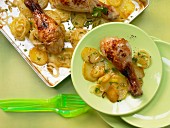 Chicken legs with potatoes and onions
