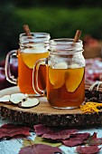 Hot mulled milled cider on an autumn table