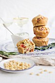 Savoury muffins with salami, red peppers, sweetcorn and pine nuts