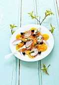 Orange salad with red onions and olives