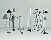 Various designer floor lamps casting shadows