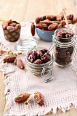 Medjool dates in different containers
