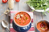Vegan cream of tomato soup with roasted tomatoes and olive oil