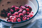 Frozen raspberries in a bowl