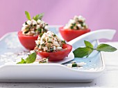 Stuffed tomatoes with zucchini cubes and mint
