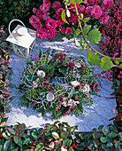 Grave wreath stuck on moist floral foam, Abies (fir),