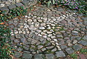 Paving of natural stones