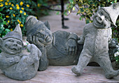 Gymnastic garden gnomes made of cement